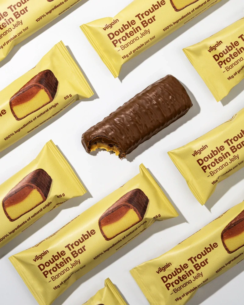 Vilgain Double Trouble Protein Bar - Banánové želé v čokoládě